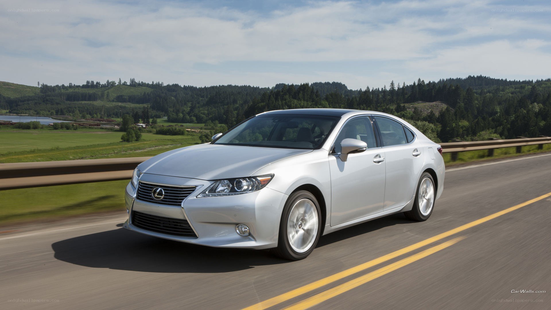 silver lexus driving on road