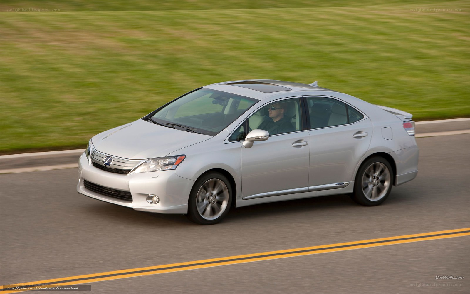 silver lexus driving on road