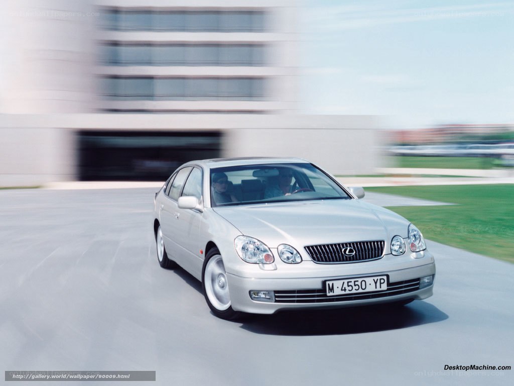 silver lexus driving on road