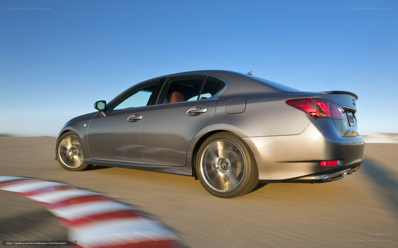 silver lexus driving on track