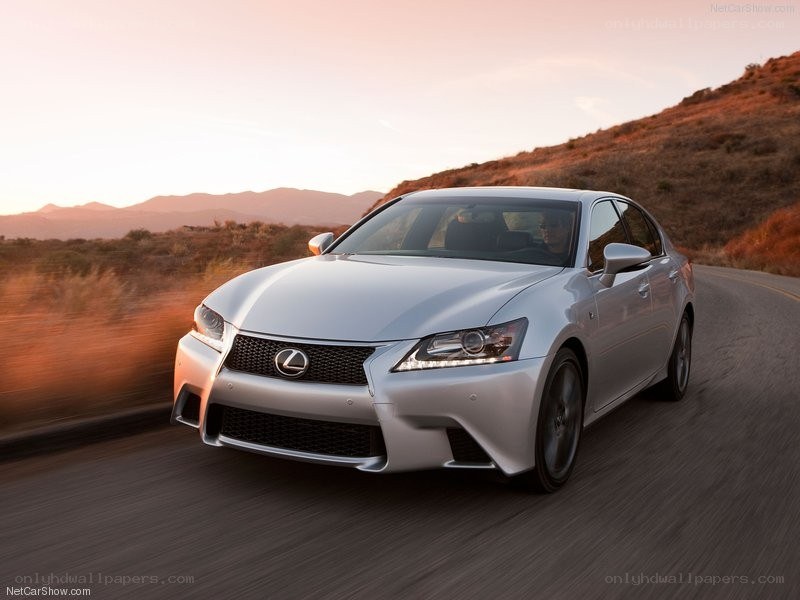 silver lexus gs driving on road