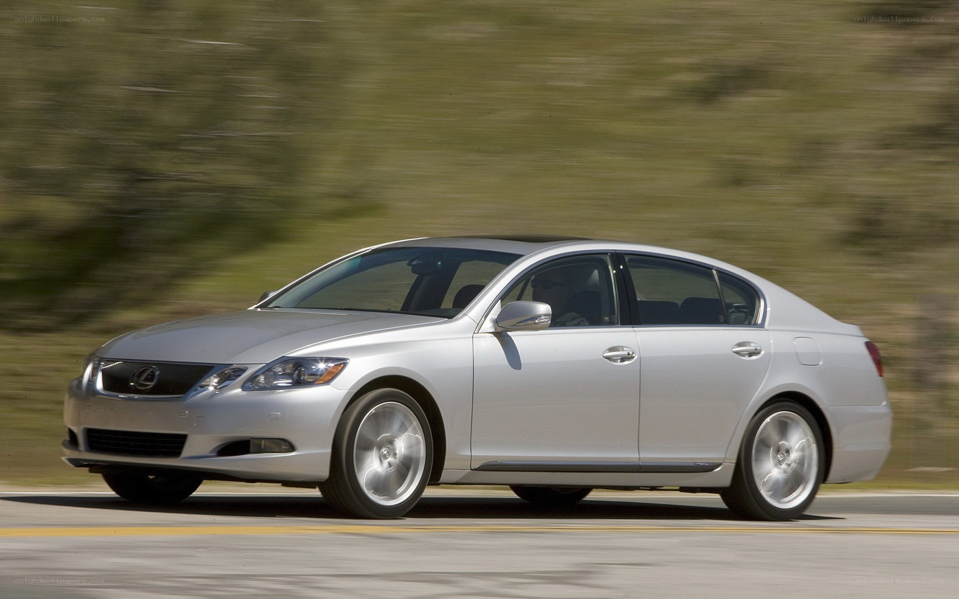 silver lexus gs in motion