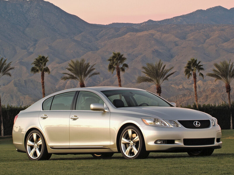 Silver Lexus GS on a grassy field