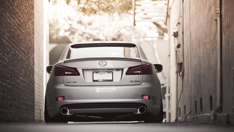 silver lexus in alley