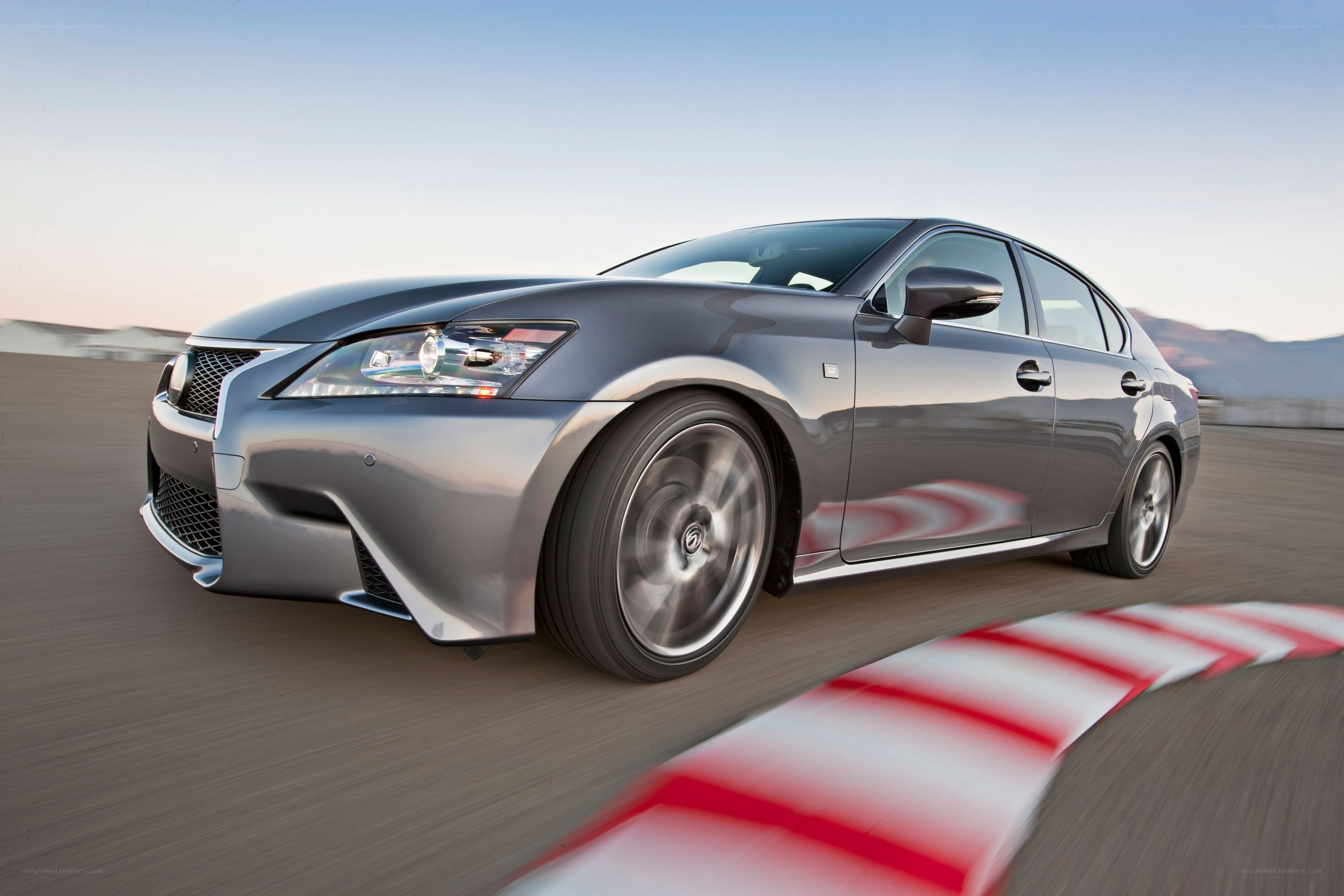 silver lexus in motion