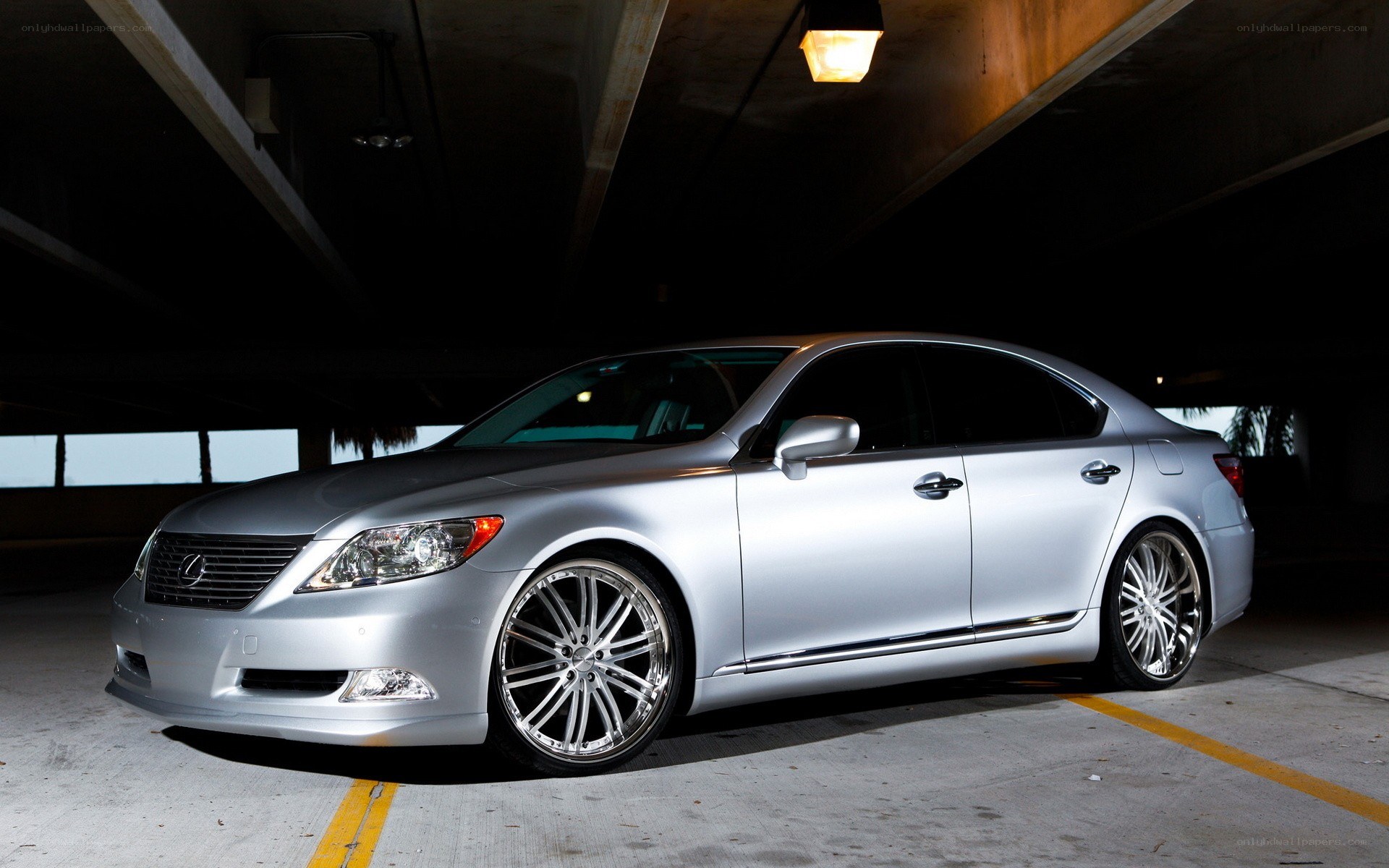 silver lexus in parking garage