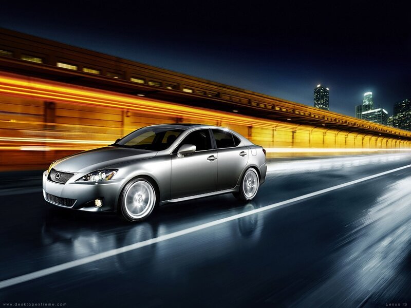 Silver Lexus IS on city highway