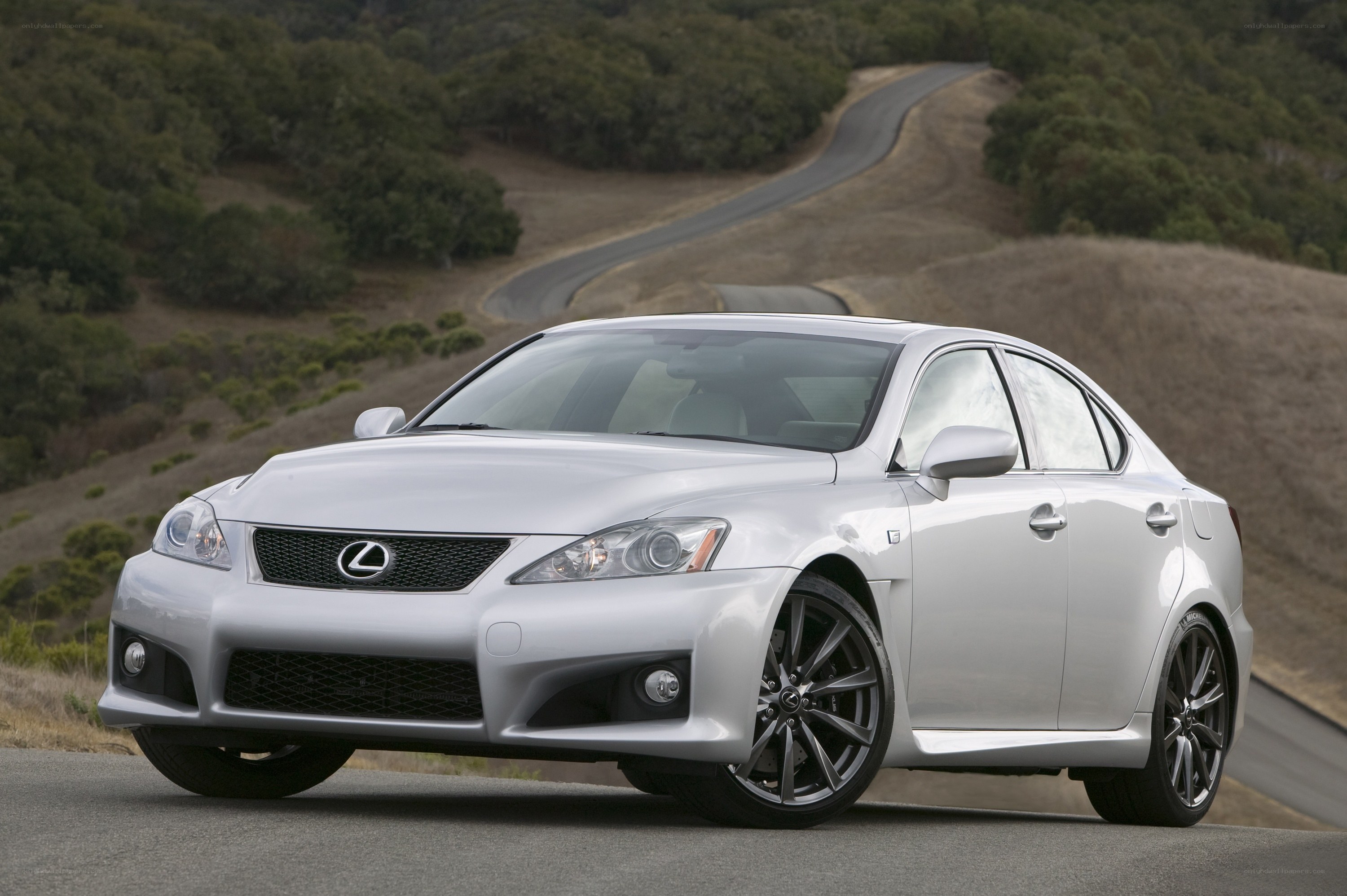 silver lexus is250c on winding road