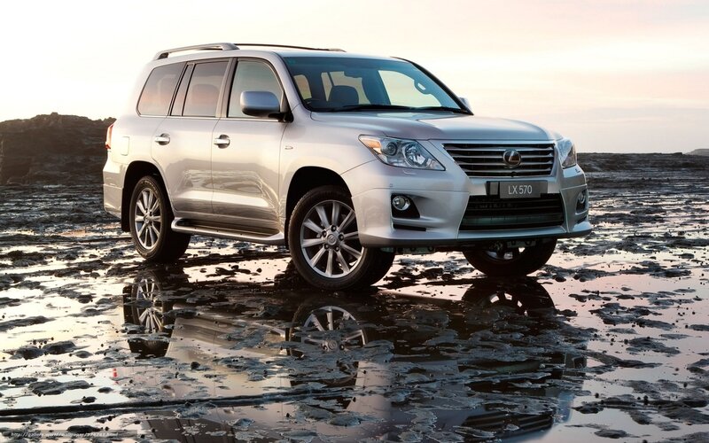 Silver Lexus LX 570 on beach