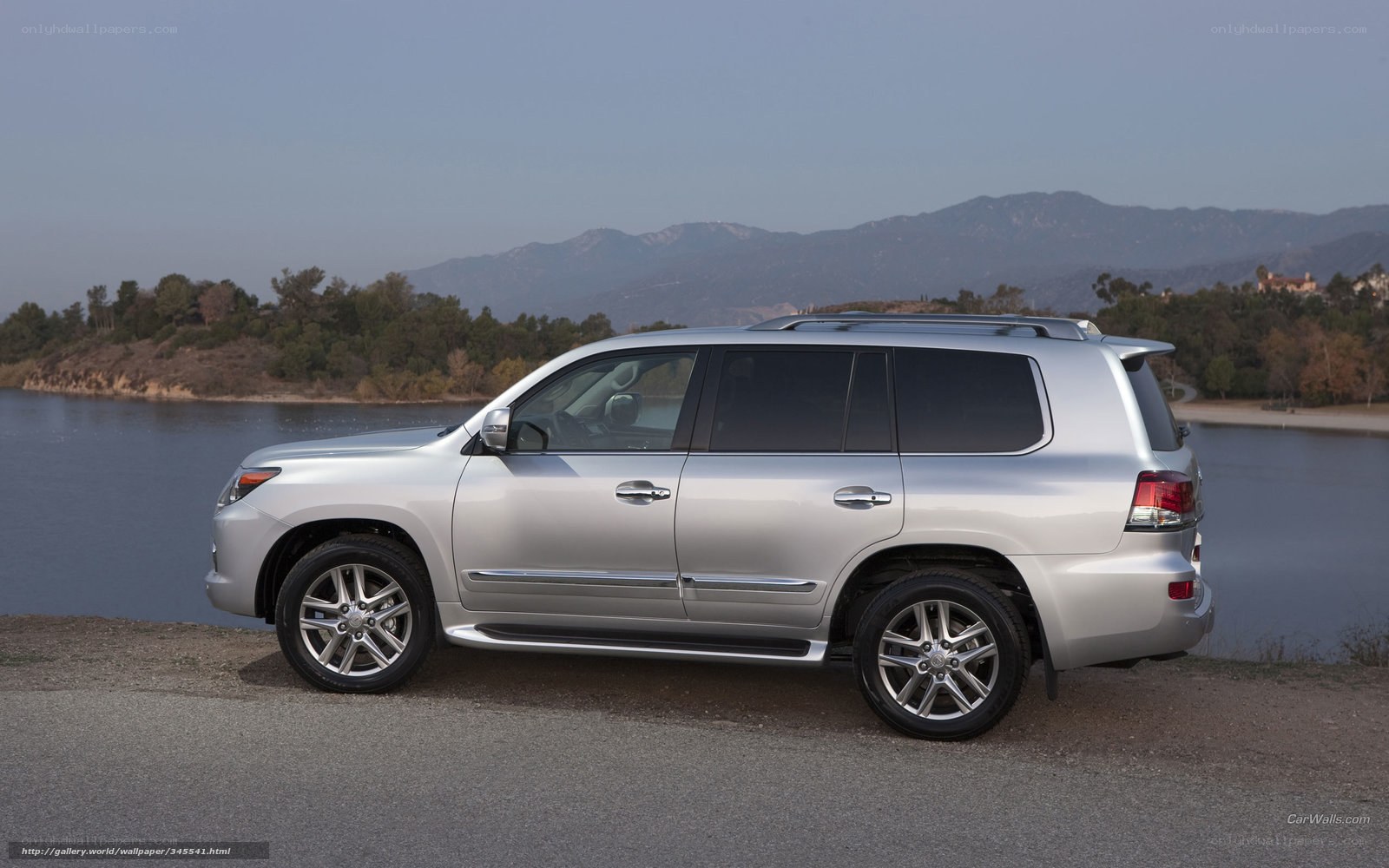 silver lexus lx suv by lake