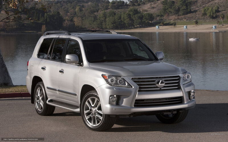 Silver Lexus LX570 by a lake