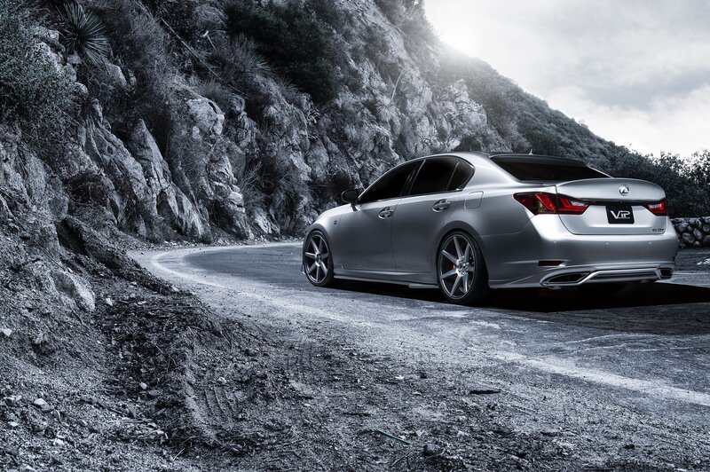 Silver Lexus on a mountain road