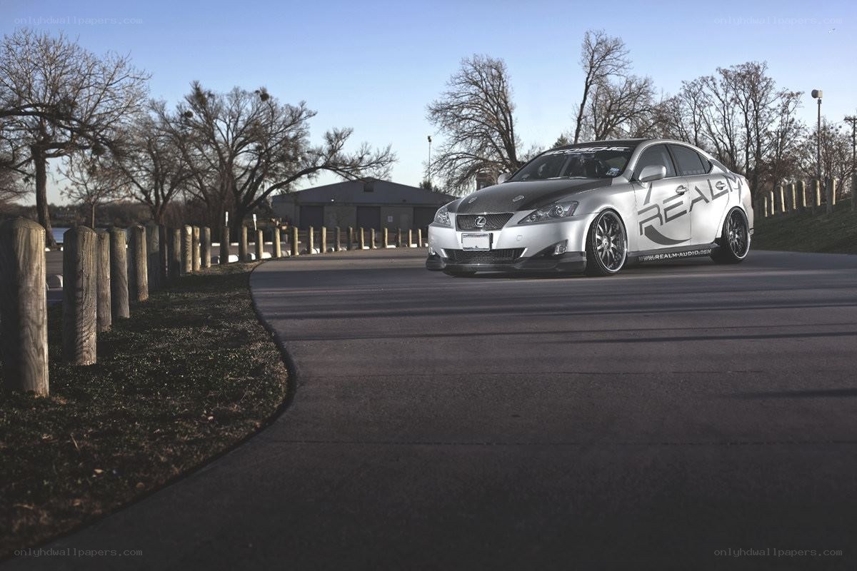 silver lexus on a park road