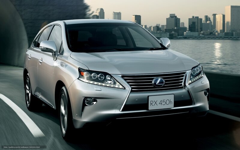 Silver Lexus RX 450h on city road