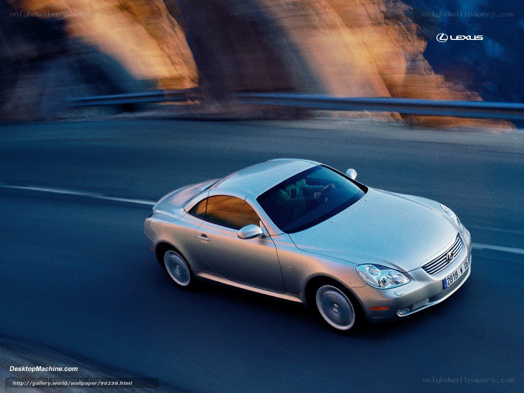 Silver Lexus SC driving on road