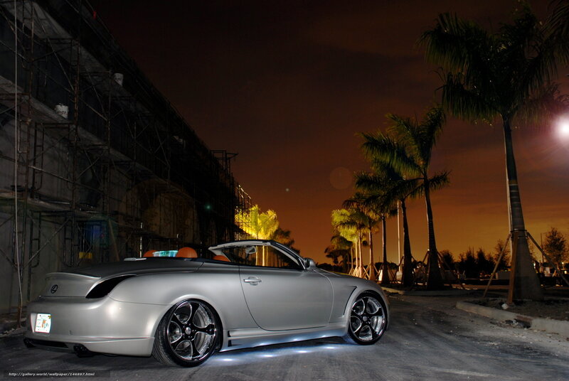 Silver Lexus SC430 at night