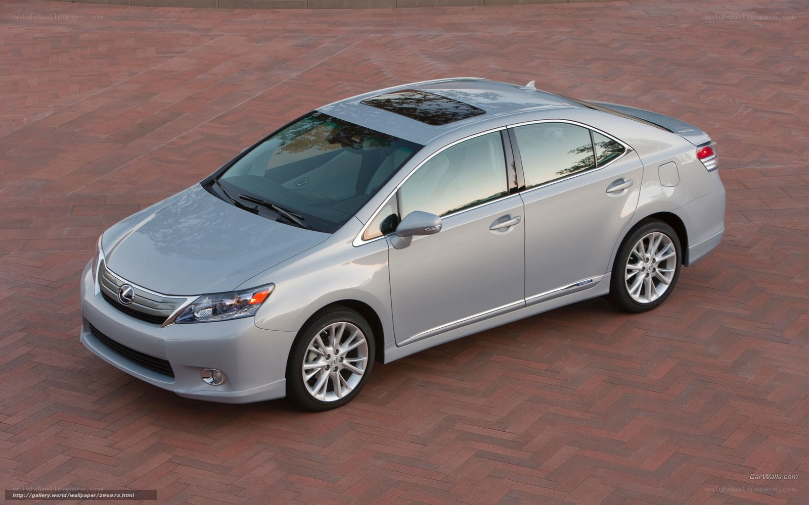 silver lexus sedan on brick