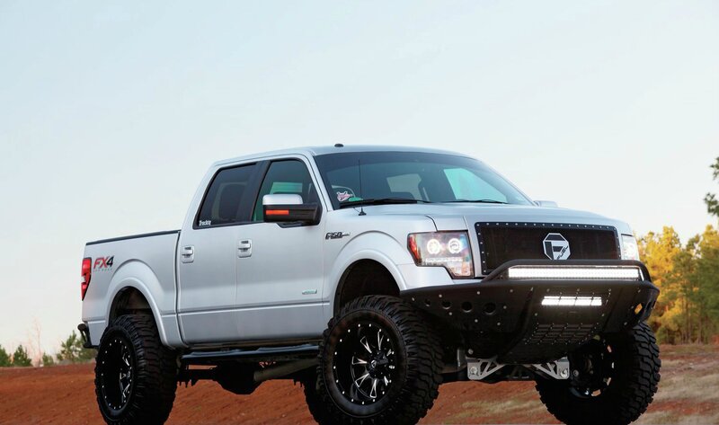 Silver Lifted Pickup Truck — Outdoor, Sunset