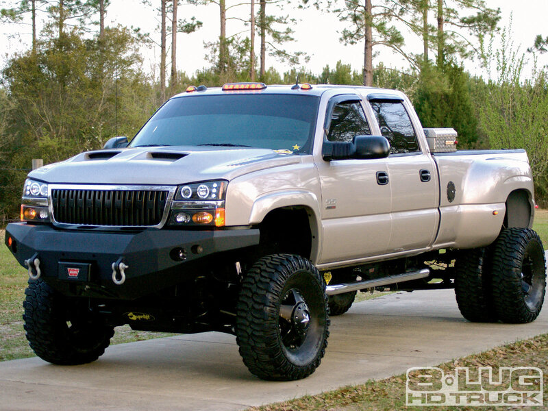 Silver Lifted Pickup Truck — Outdoors