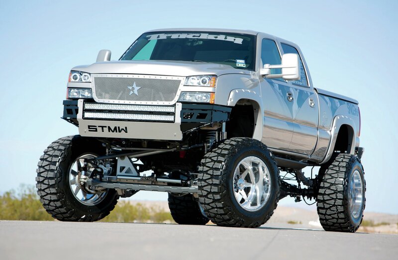 Silver Lifted Truck — Dramatic, Afternoon