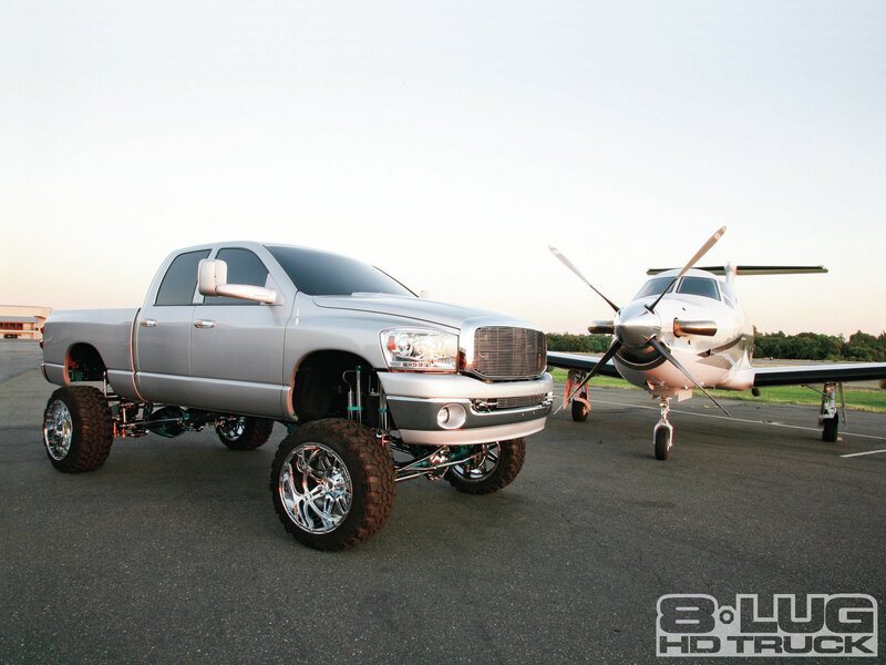 Silver Lifted Truck — Dramatic, Sunset