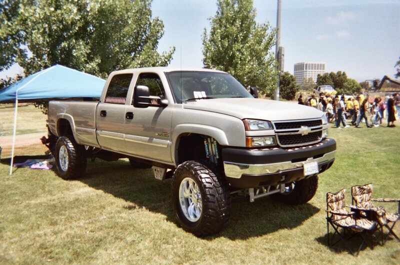 Silver Lifted Truck — Green