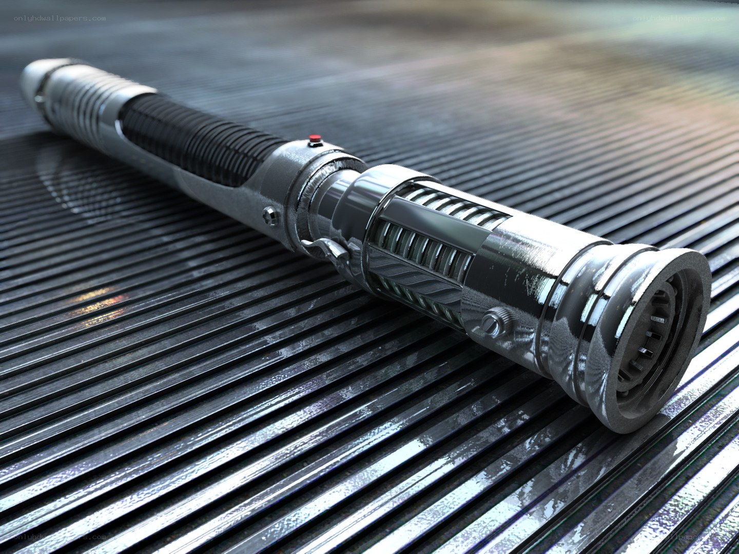 silver lightsaber on metal surface