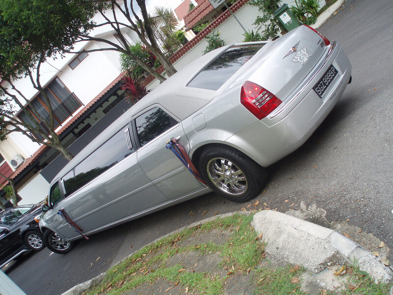 silver limousine on street