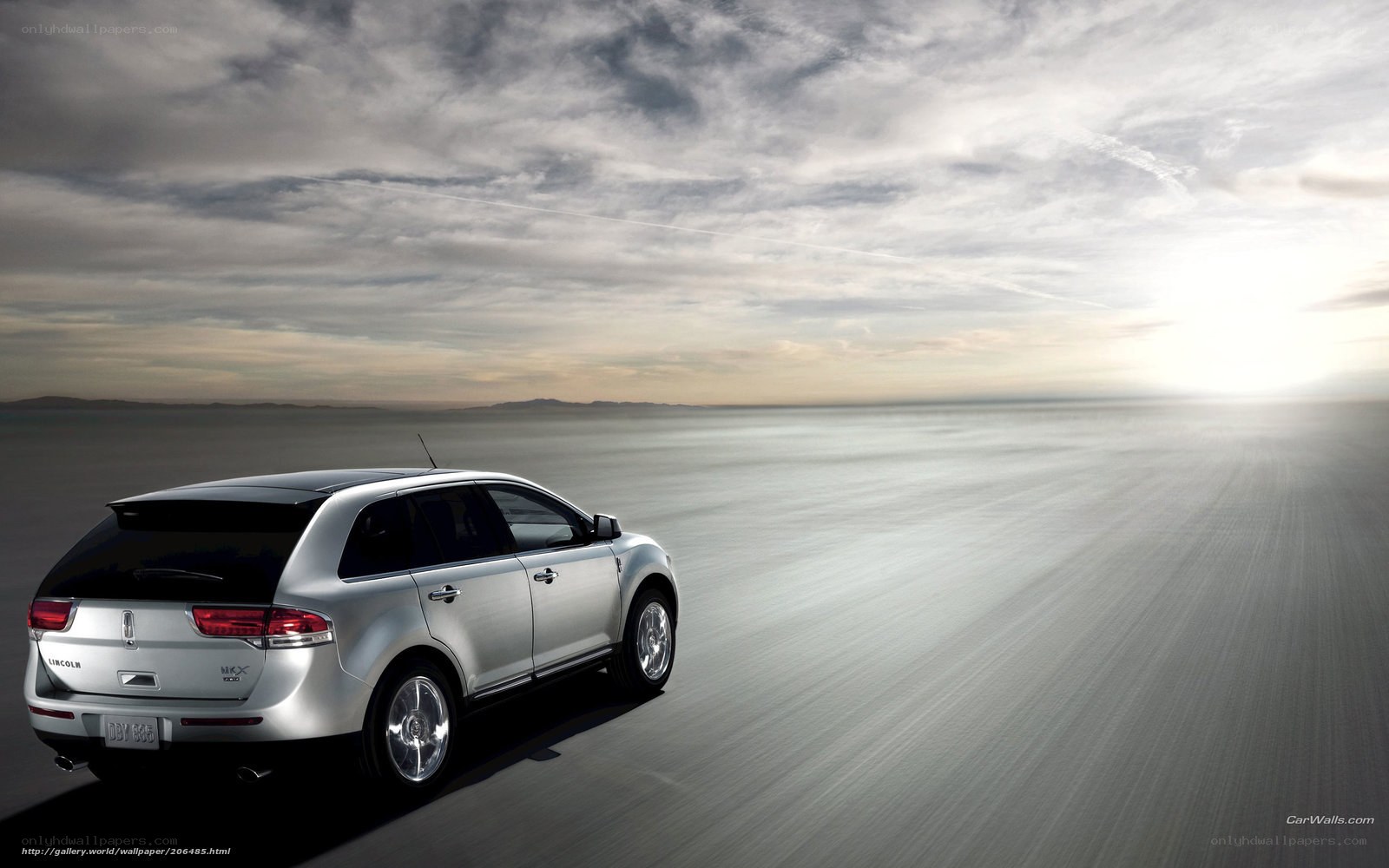Silver Lincoln MKX on open road