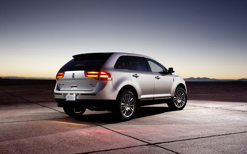 Silver Lincoln SUV — Dramatic, Sunset