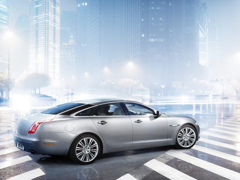 silver luxury car in city
