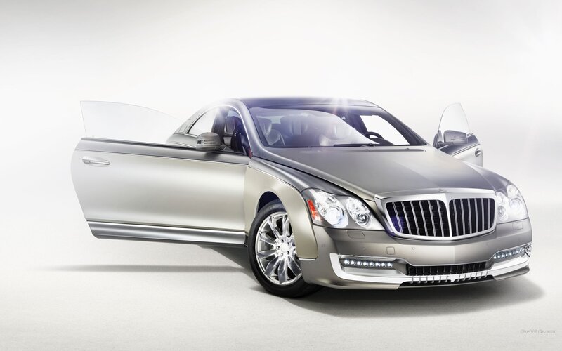 silver luxury car with open doors