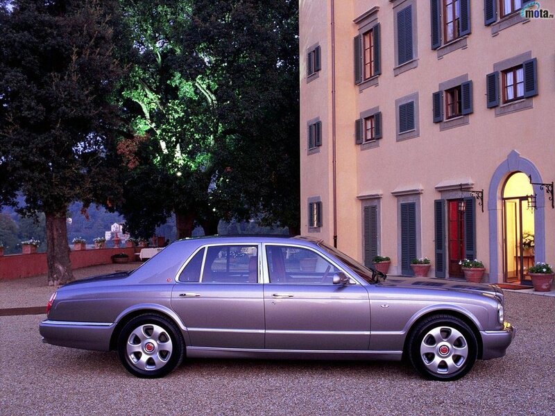 silver luxury sedan at villa