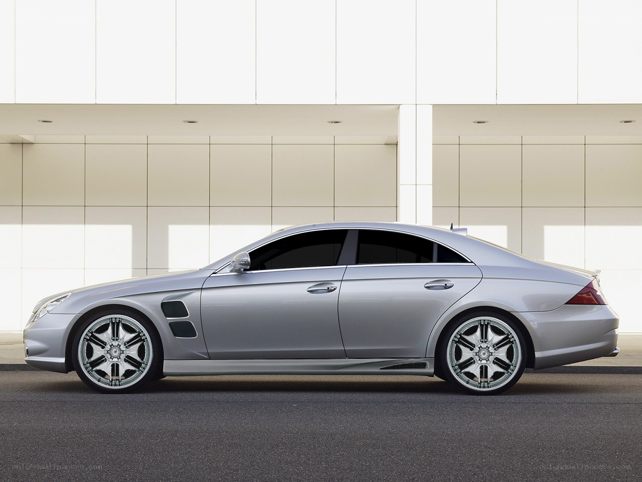 silver luxury sedan side view