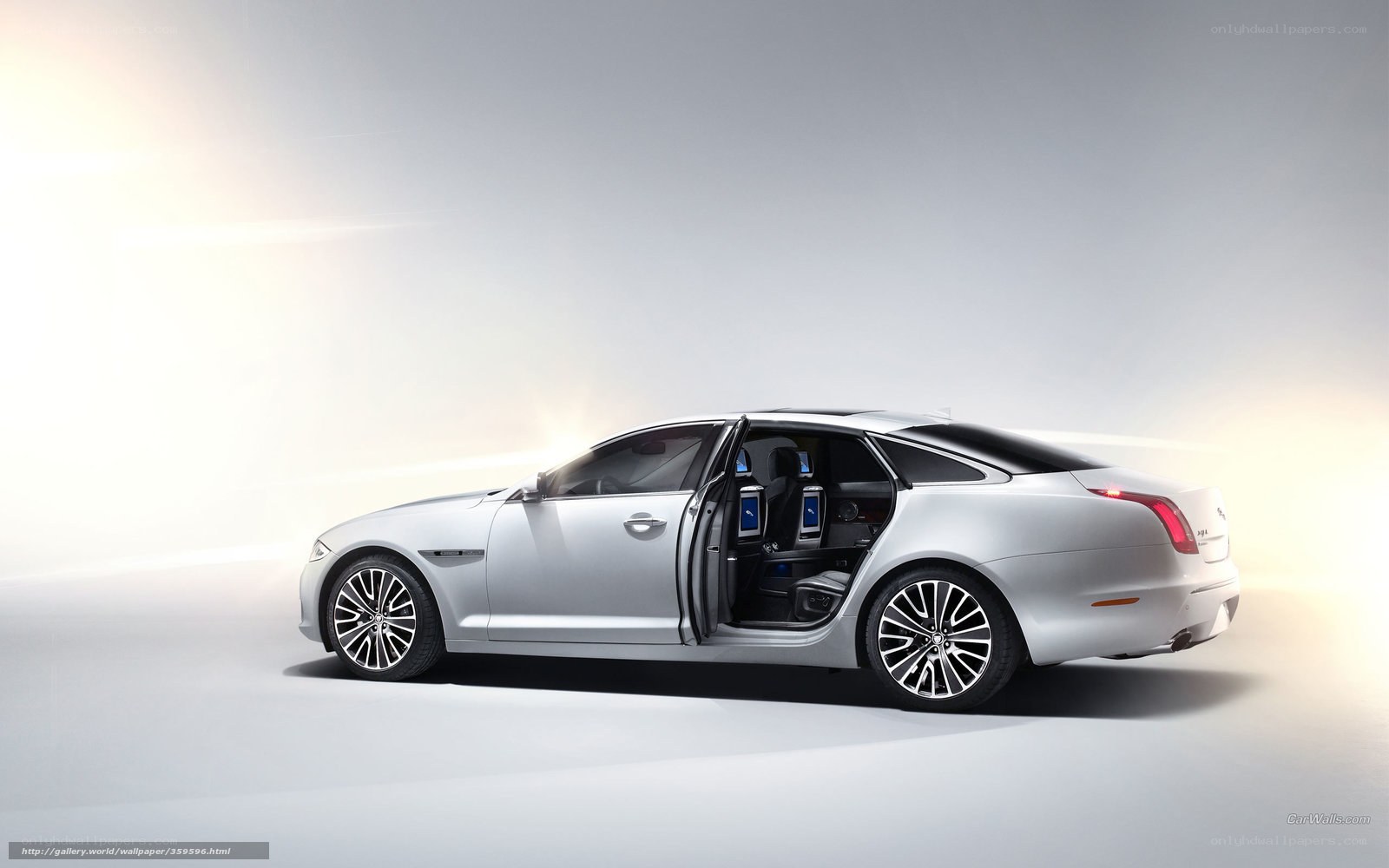 silver luxury sedan with open door