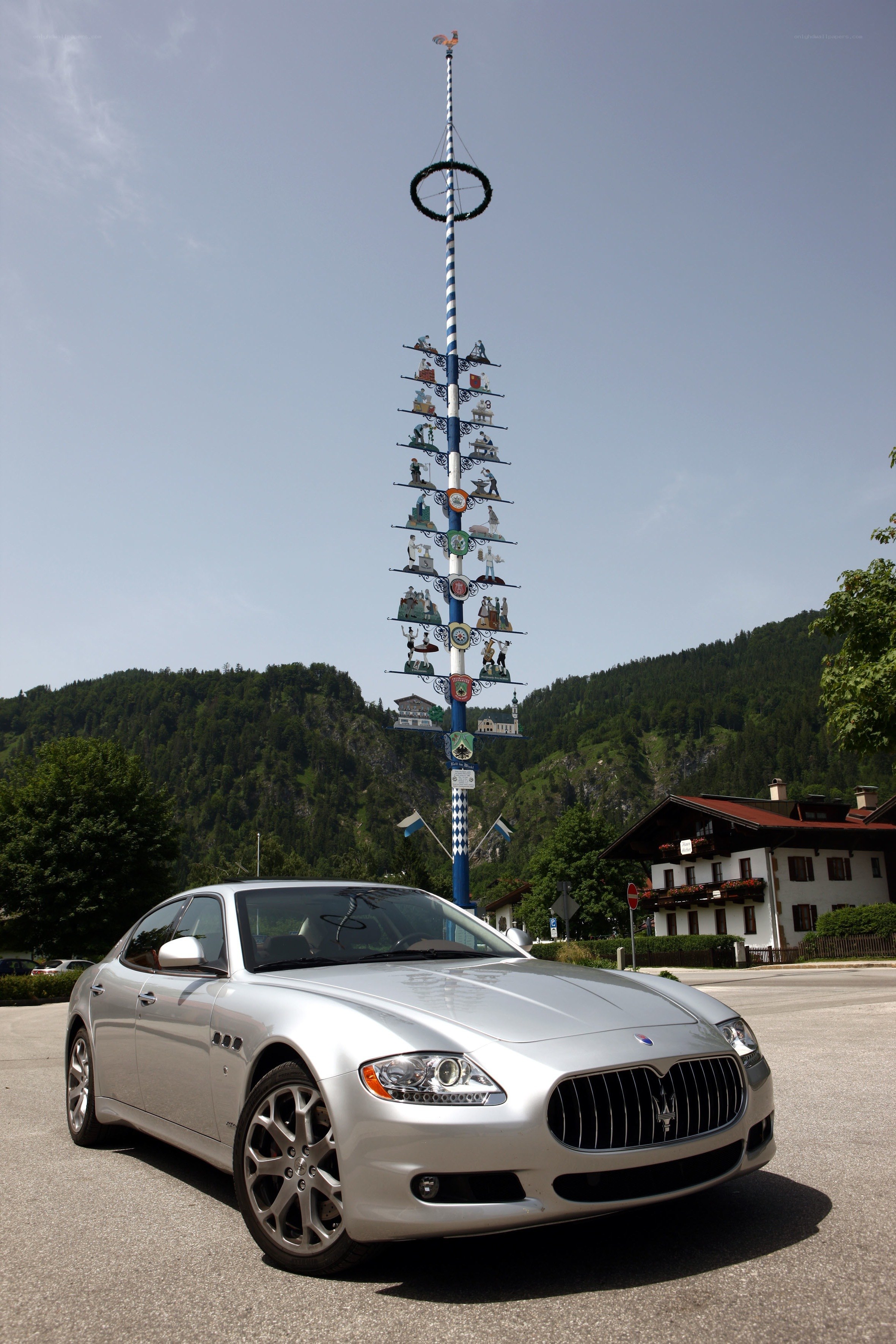 Silver Maserati by a maypole