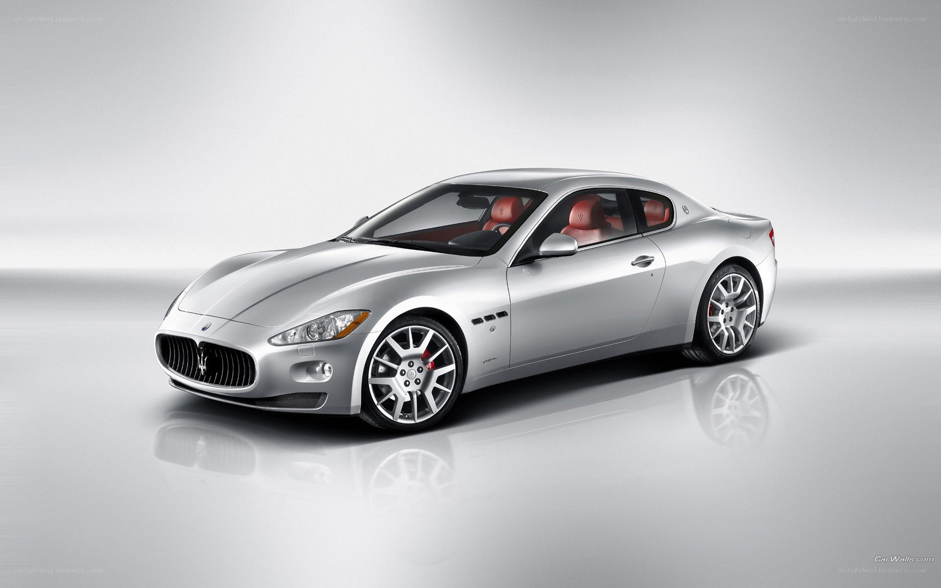 silver maserati coupe