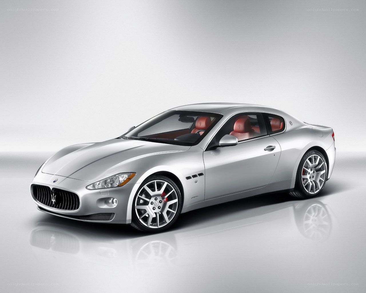 silver maserati coupe