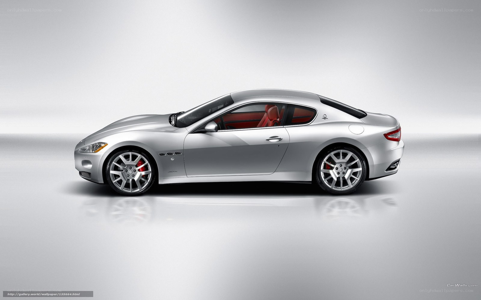 silver maserati coupe