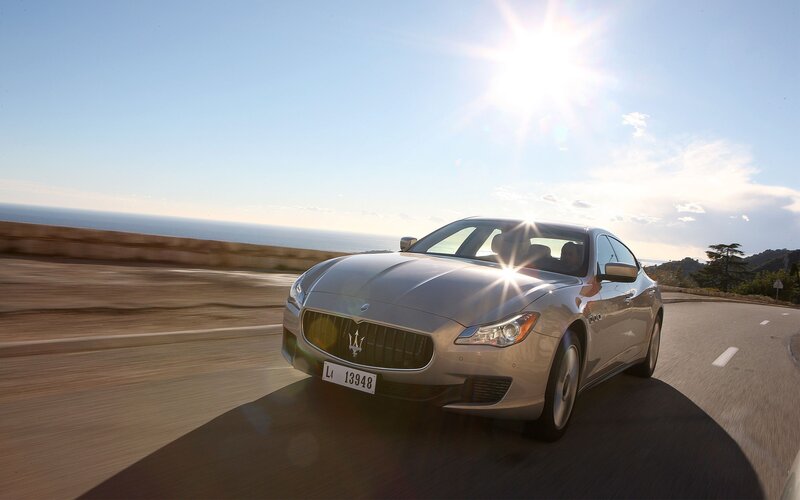 Silver Maserati Driving — Dramatic