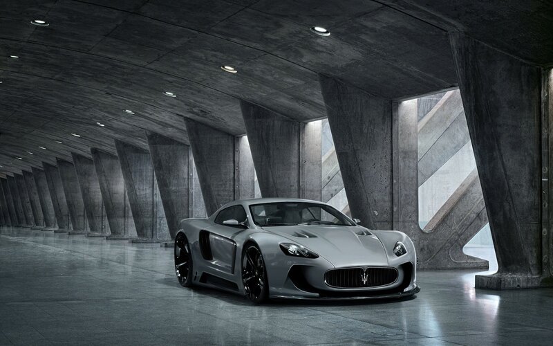 Silver Maserati in concrete tunnel