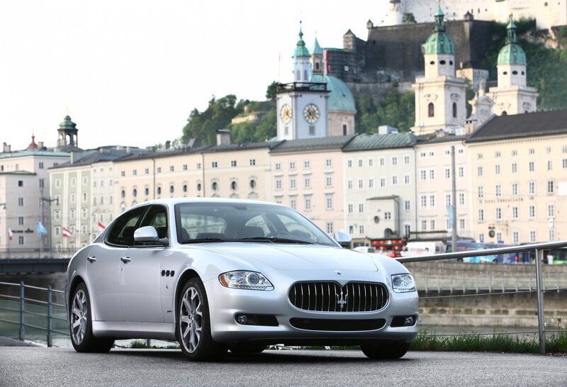 Silver Maserati on a city street