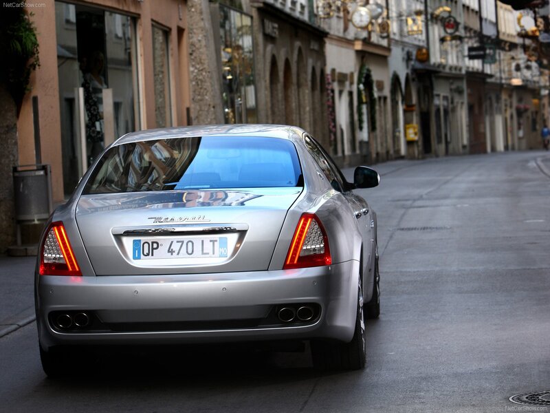 Silver Maserati on a city street