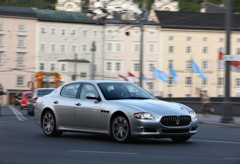 Silver Maserati on city street