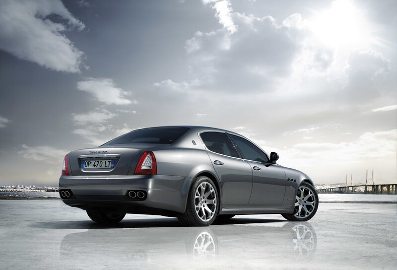 Silver Maserati sedan on wet pavement