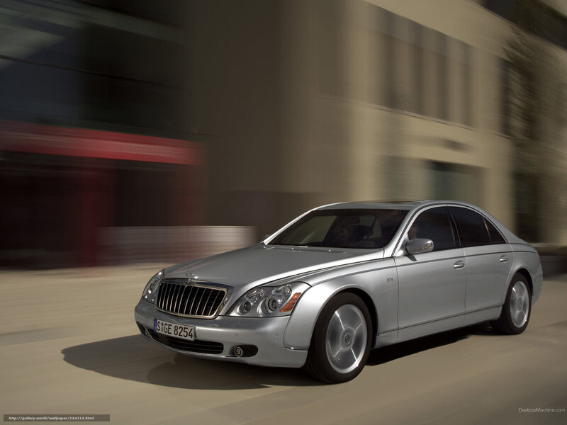 silver maybach driving on city street