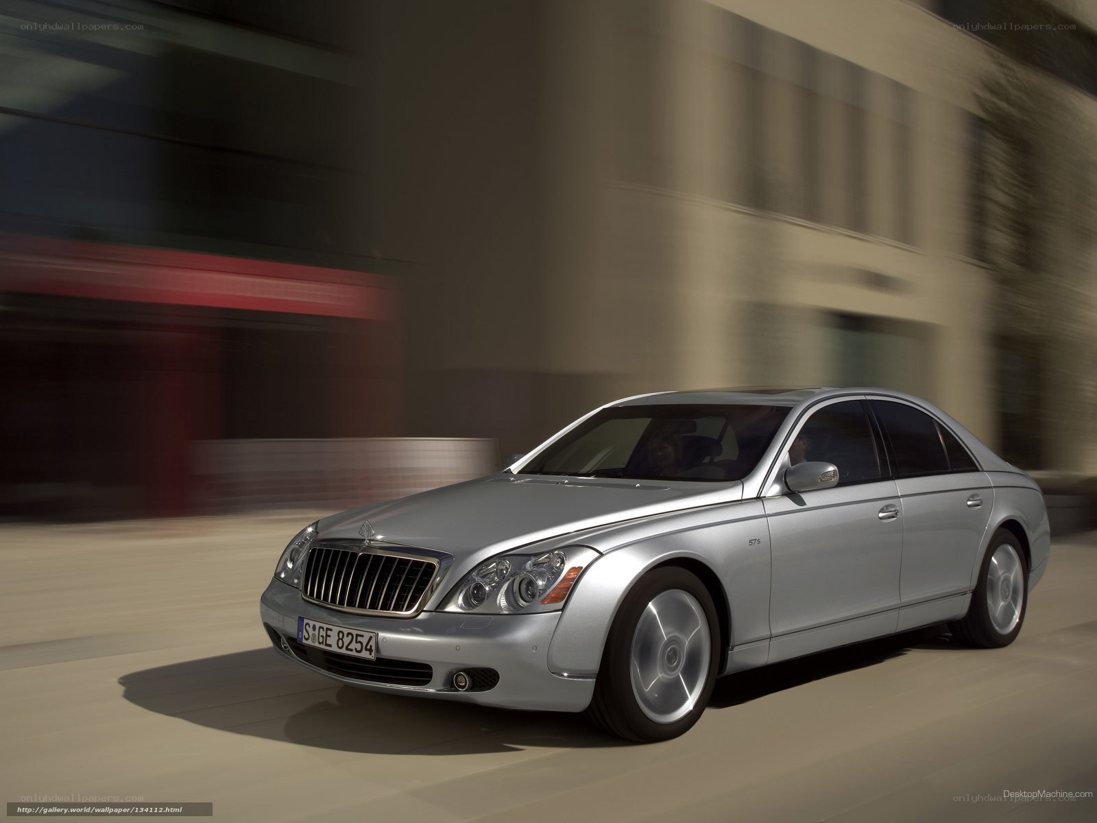 silver maybach driving on city street