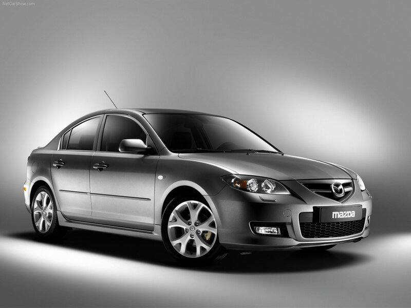 Silver Mazda 3 Sedan — Gray, Dramatic