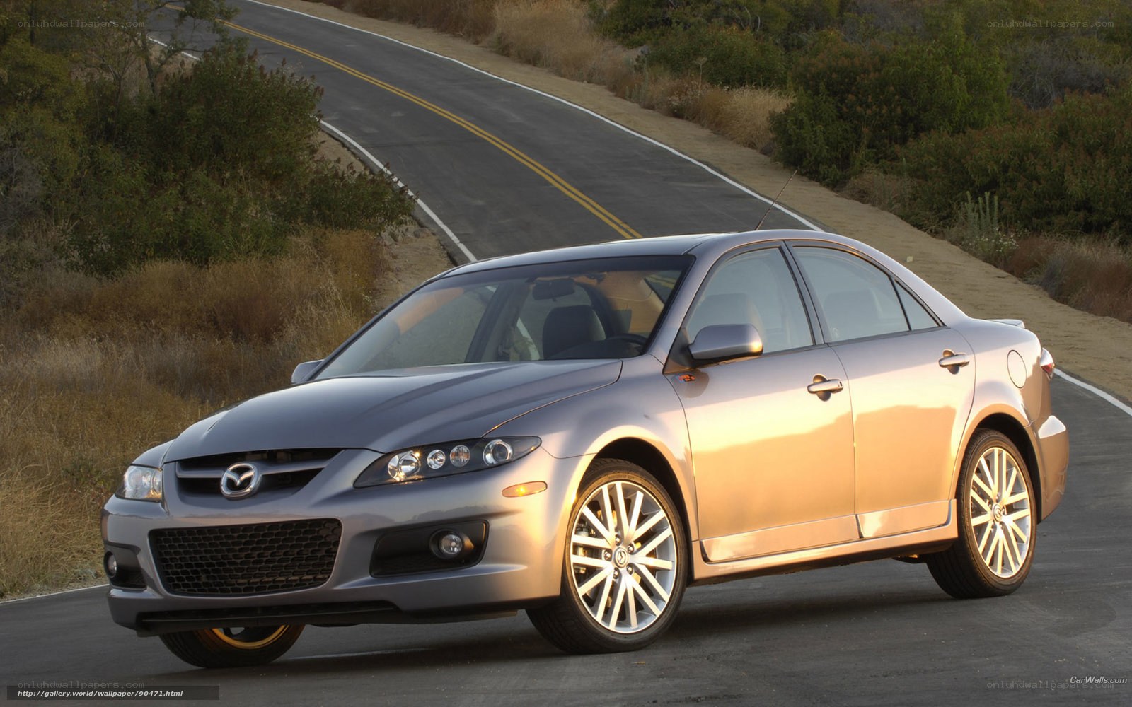 silver mazda 6 on winding road