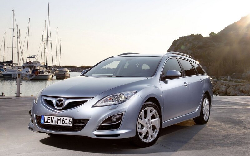 Silver Mazda 6 Wagon by the harbor